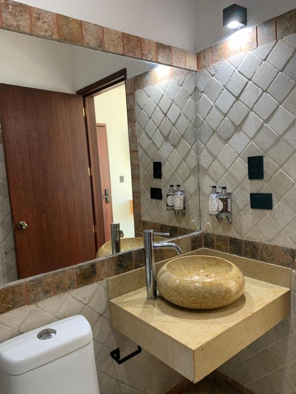 Koupelna v ubytování CHOLULA SUITES