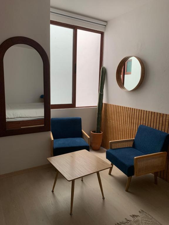 Posezení v ubytování CHOLULA SUITES