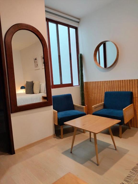 Posezení v ubytování CHOLULA SUITES