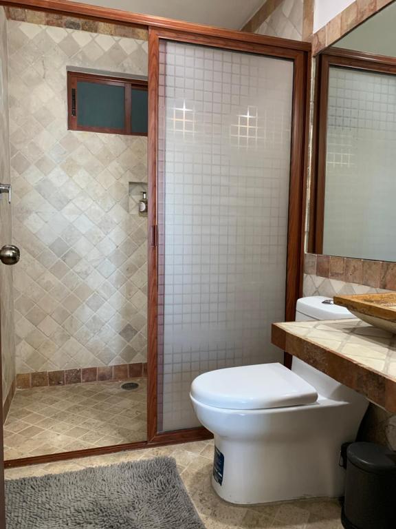 Koupelna v ubytování CHOLULA SUITES