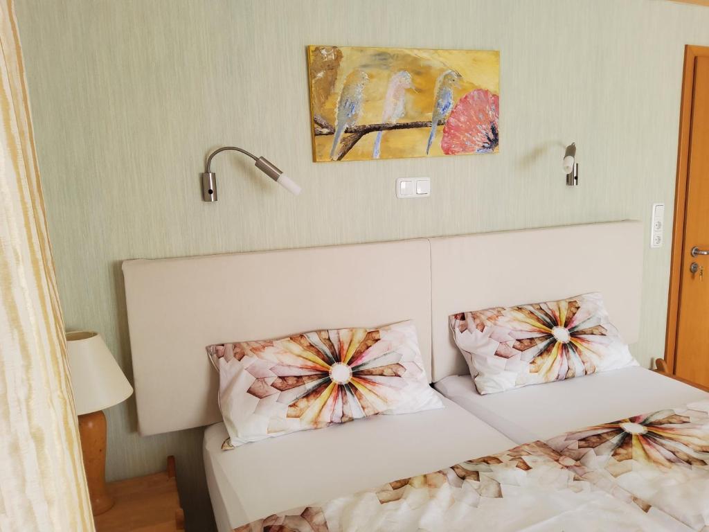 Postel nebo postele na pokoji v ubytování B & B Gästehaus Schmidt