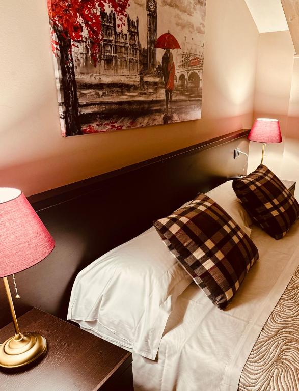 Postel nebo postele na pokoji v ubytování Hotel Malpensa INN Aereoporto