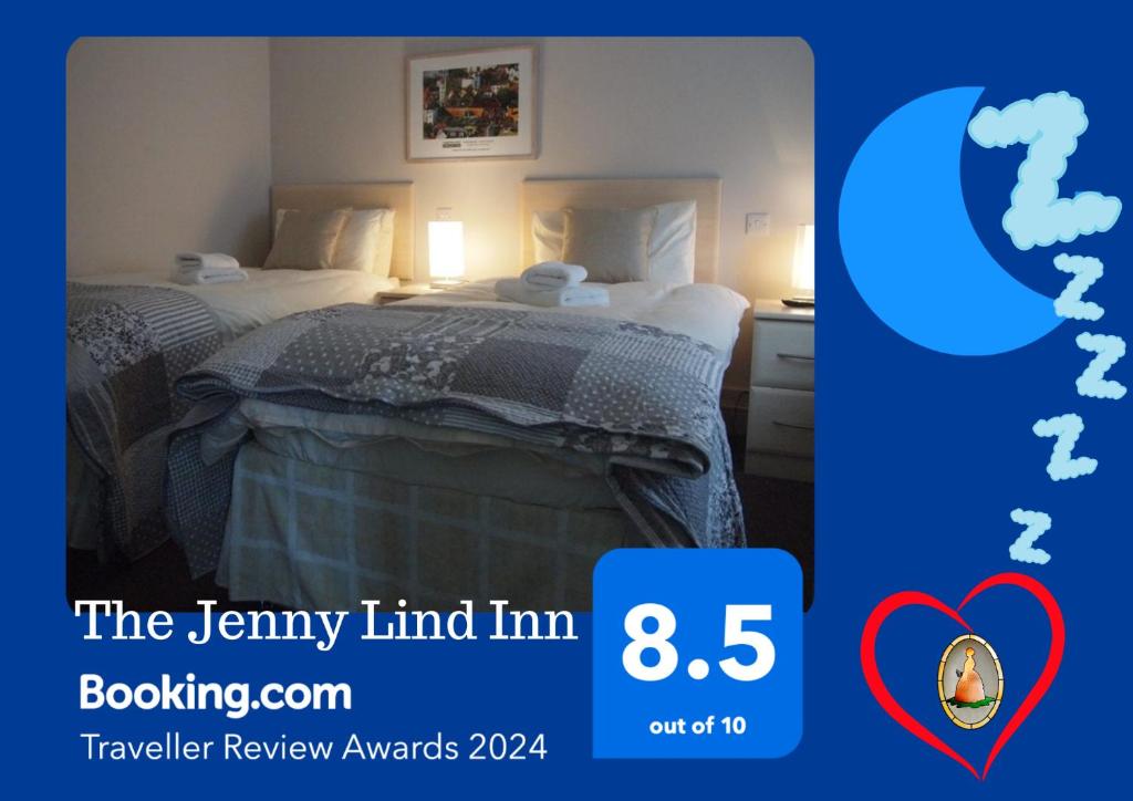 a hotel room with a bed with a heart on it at The Jenny Lind in Hastings