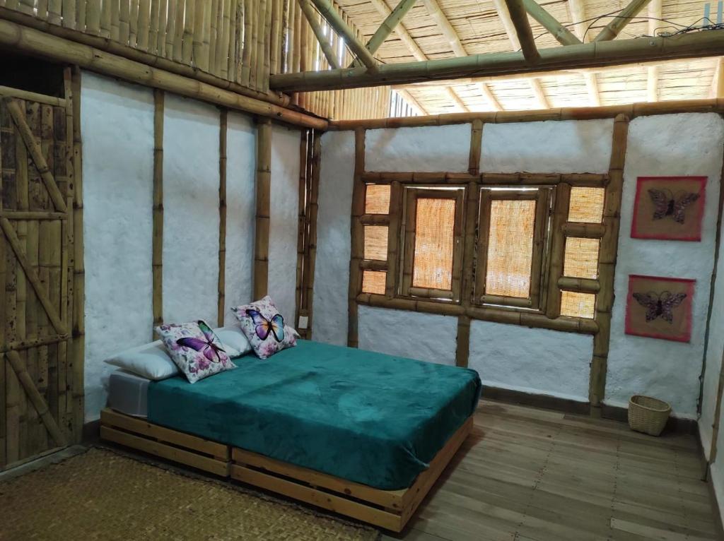 Postel nebo postele na pokoji v ubytování Casita del bosque