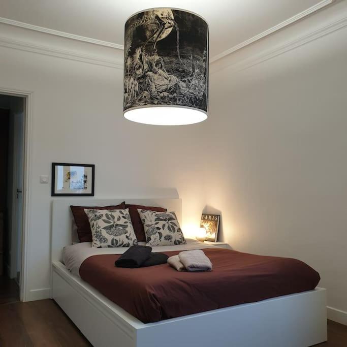 Poste&#x13E; alebo postele v izbe v ubytovan&iacute; Charming &amp; practical near Paris