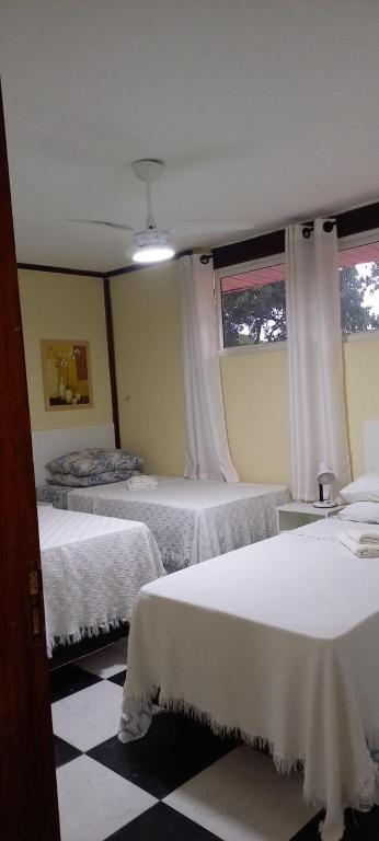Postel nebo postele na pokoji v ubytování Kzazendf Cama&Cafe Hospedagem Familiar