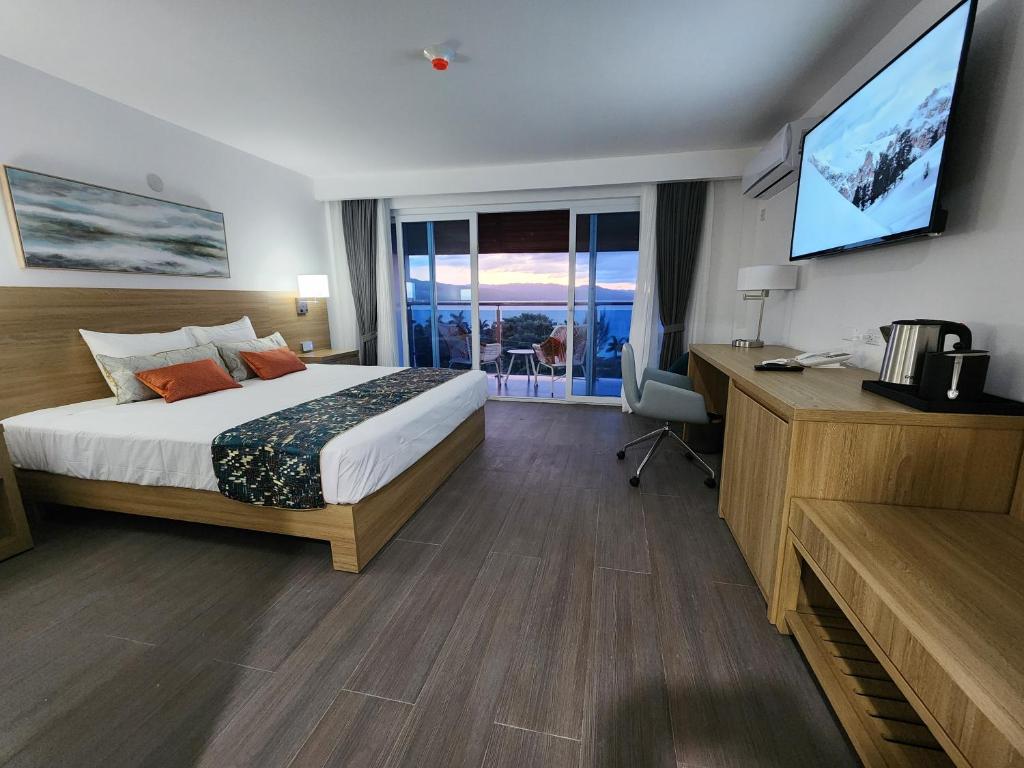 Postel nebo postele na pokoji v ubytování Hotel 39 Jamaica