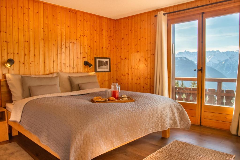Postel nebo postele na pokoji v ubytování Chalet Alexandre