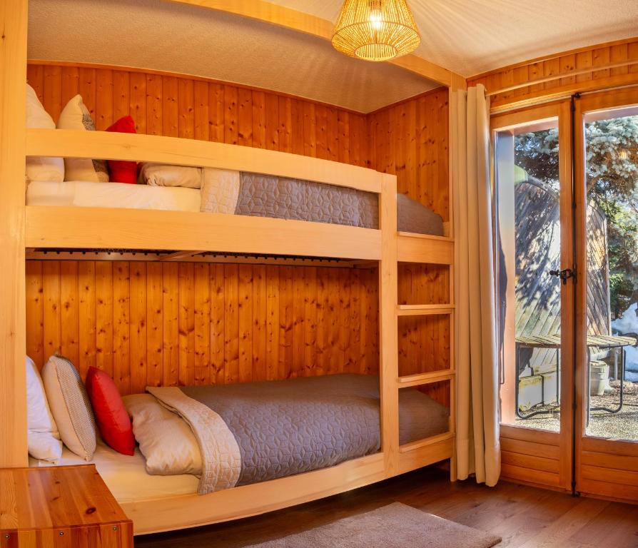 Postel nebo postele na pokoji v ubytování Chalet Alexandre