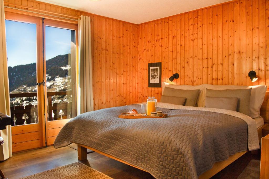 Postel nebo postele na pokoji v ubytování Chalet Alexandre
