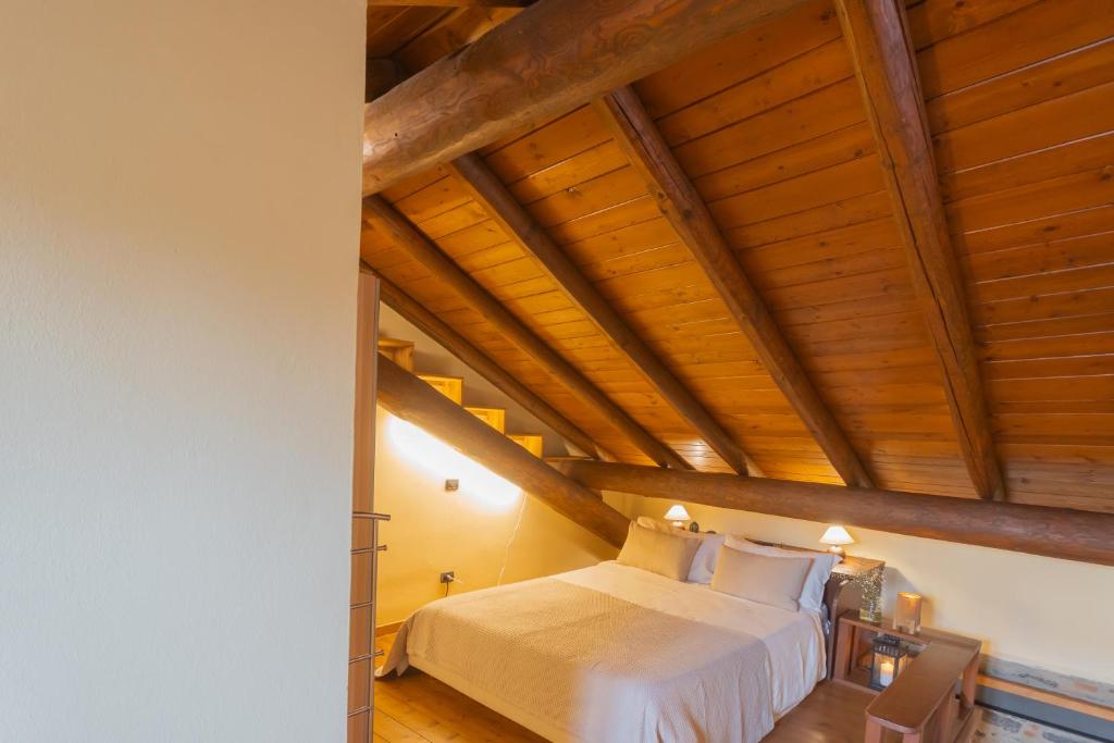 Posteľ alebo postele v izbe v ubytovaní Casa Giovio Elengant loft in historical building