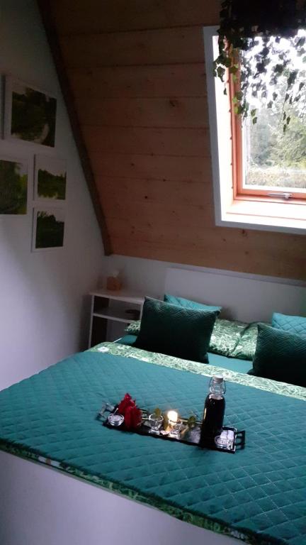 Postel nebo postele na pokoji v ubytování Zaciszny Zakątek Zawoja