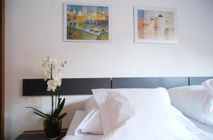 Postel nebo postele na pokoji v ubytování Hotel Central