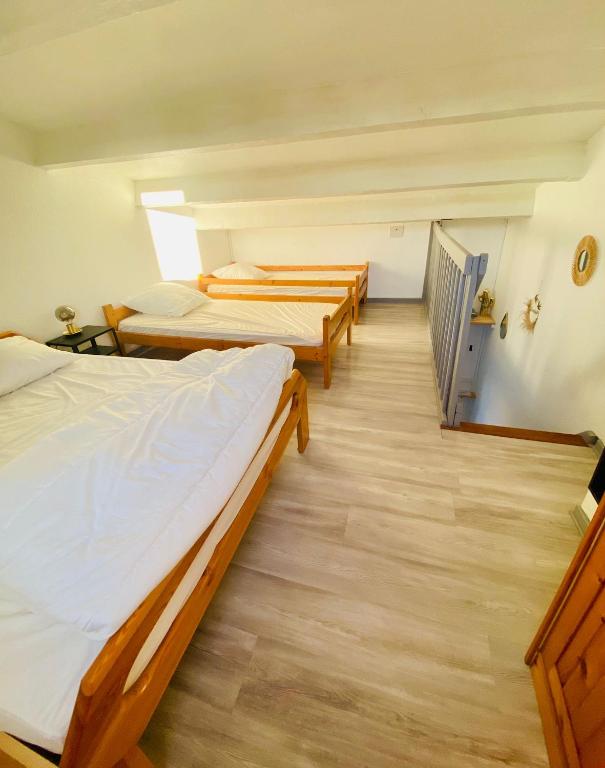 Postel nebo postele na pokoji v ubytování Maisonnette chaleureuse au pied du port