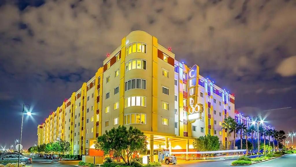 a yellow building with a sign on the side of it at Viva Las Vegas! Bluegreen Club 36 in Las Vegas