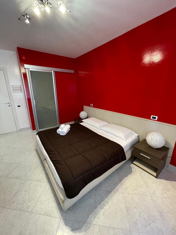 Postel nebo postele na pokoji v ubytování B&B Elia's
