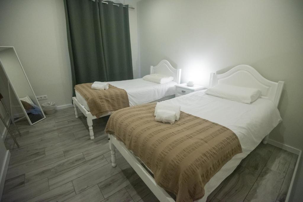 Ein Bett oder Betten in einem Zimmer der Unterkunft Vista do Tagarete