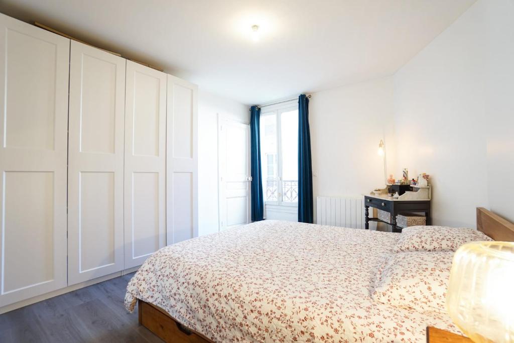 Katil atau katil-katil dalam bilik di Lovely 42 m near Canal de l&#39;Ourcq