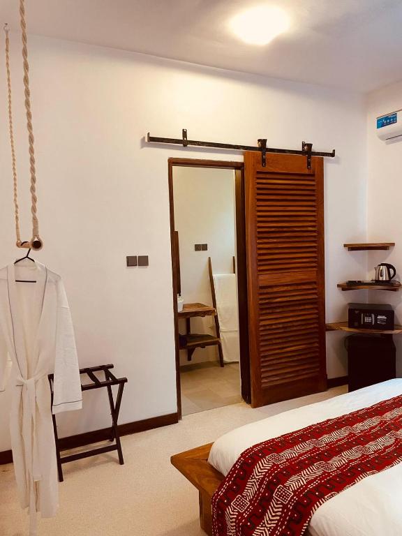 Postel nebo postele na pokoji v ubytování Oxygen Paje Hotel