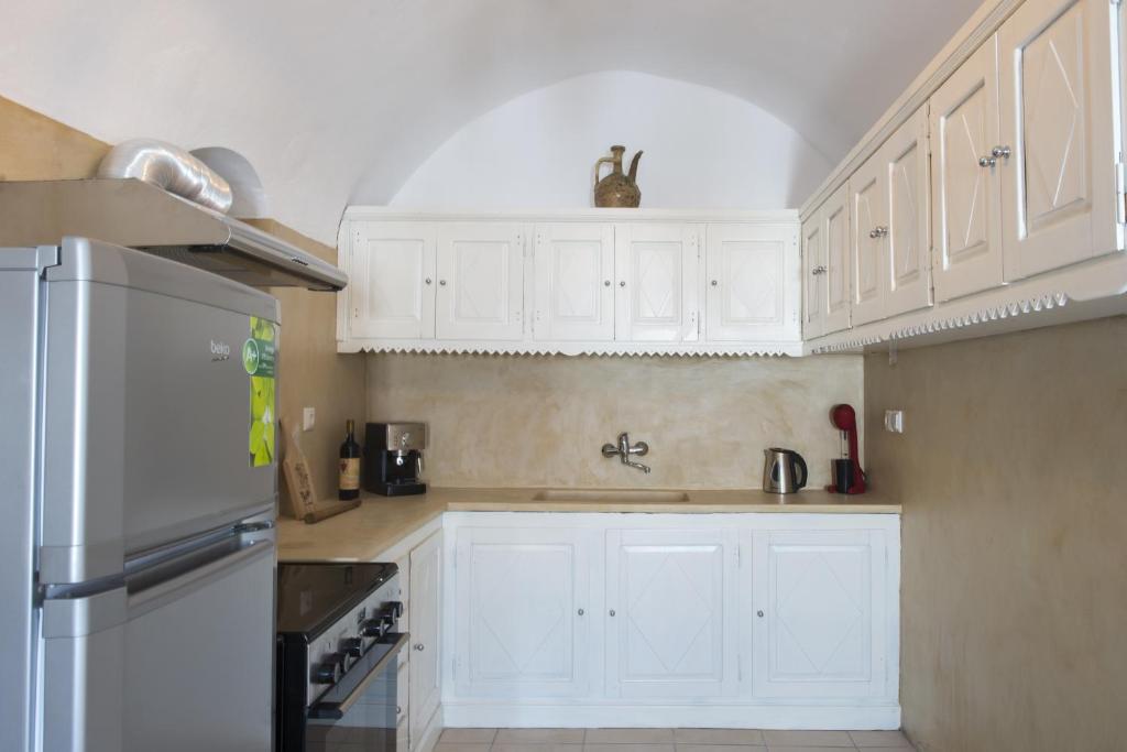 Kuchyň nebo kuchyňský kout v ubytování Simantiri Private Villa