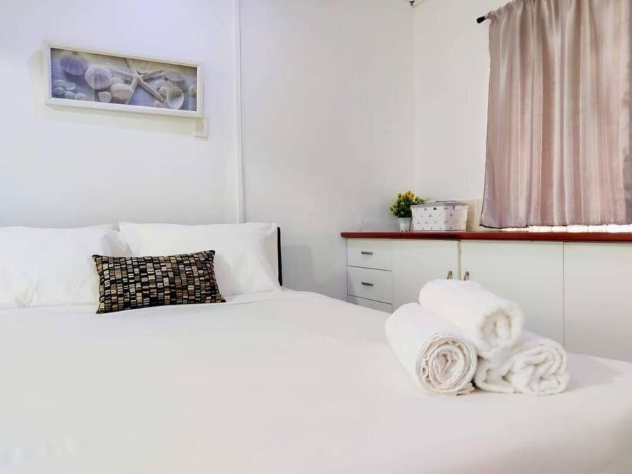 Postel nebo postele na pokoji v ubytování Guesthouse in Suva