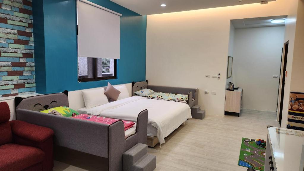 Postel nebo postele na pokoji v ubytování WanTon B&B