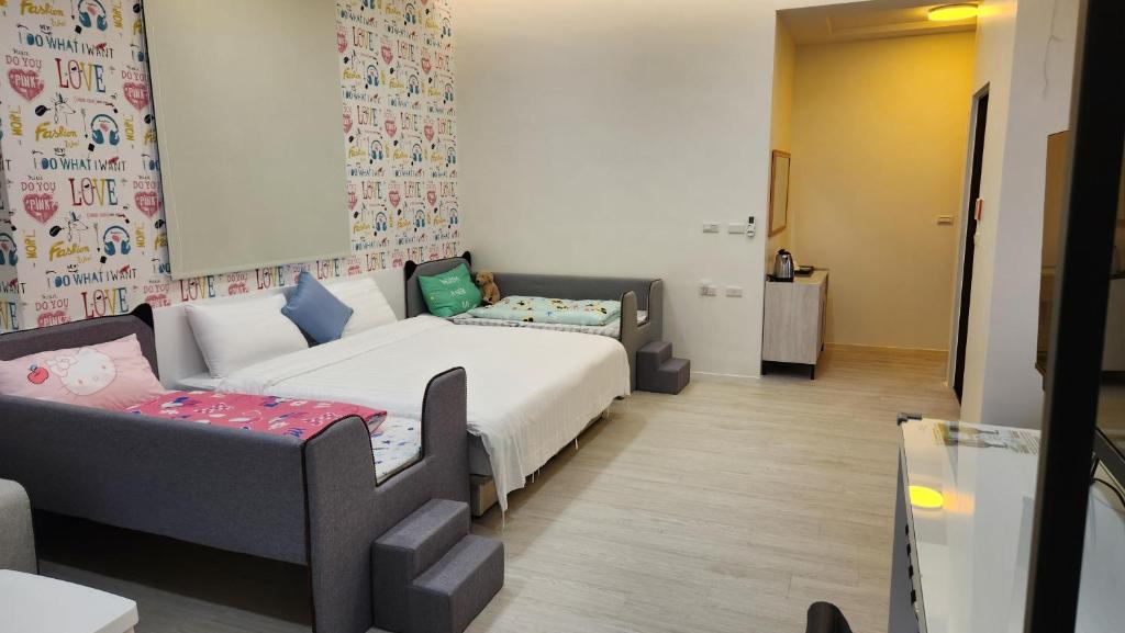 Postel nebo postele na pokoji v ubytování WanTon B&B
