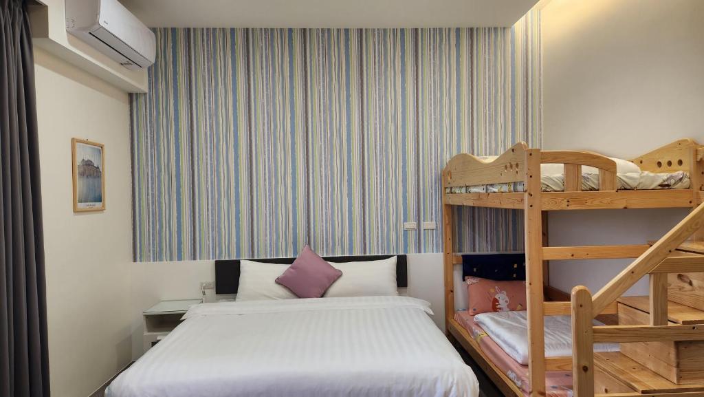 Postel nebo postele na pokoji v ubytování WanTon B&B