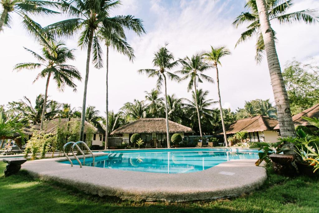Bazén v ubytování Commander Suites de Bohol nebo v jeho okolí