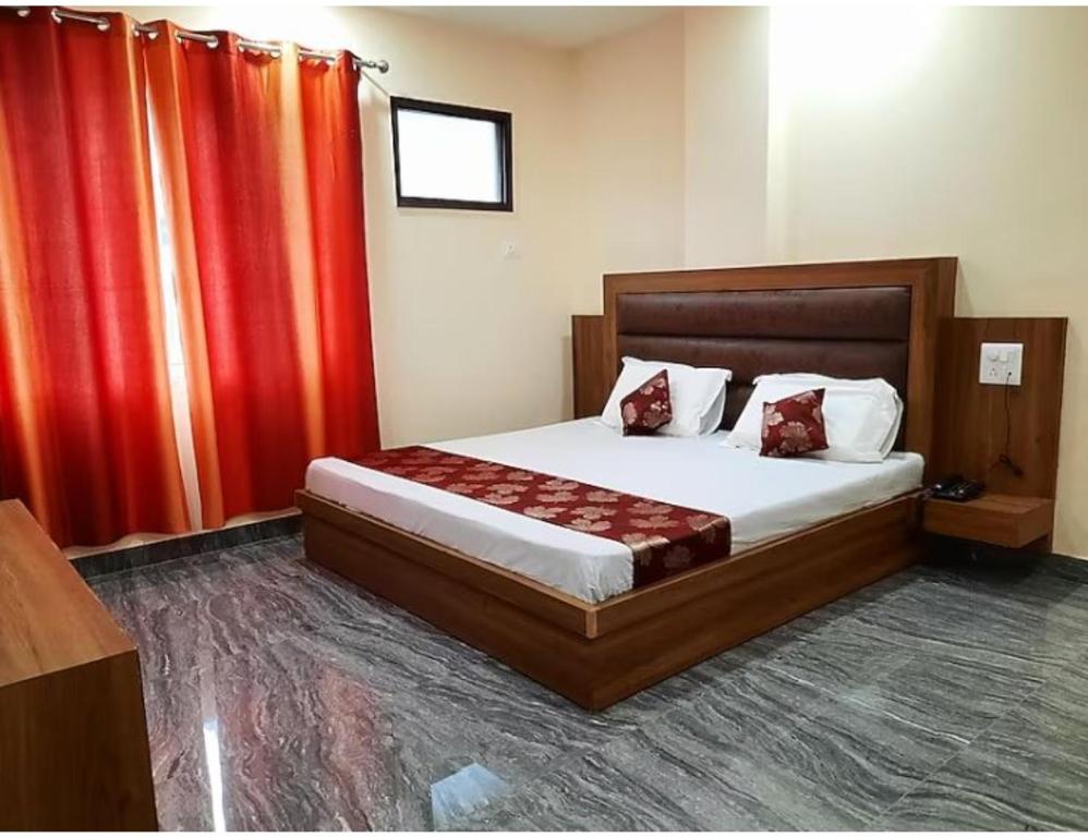 Ένα ή περισσότερα κρεβάτια σε δωμάτιο στο Hotel The Elite, Katra
