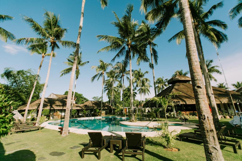 Bazén v ubytování Commander Suites de Bohol nebo v jeho okolí