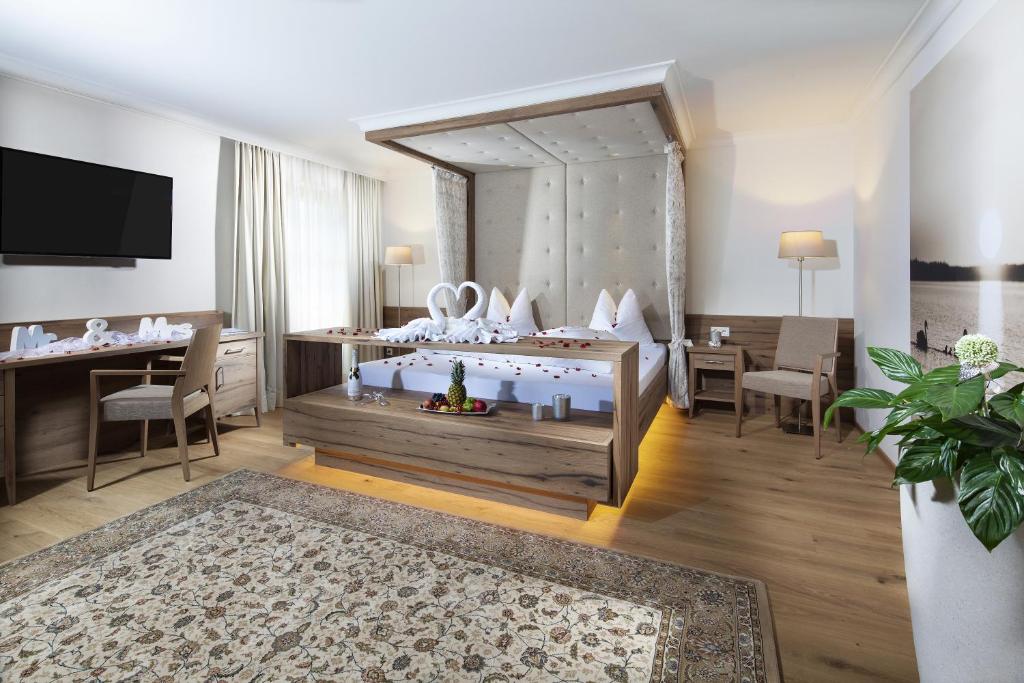 TV a/nebo společenská místnost v ubytování Hotel Metzgerwirt