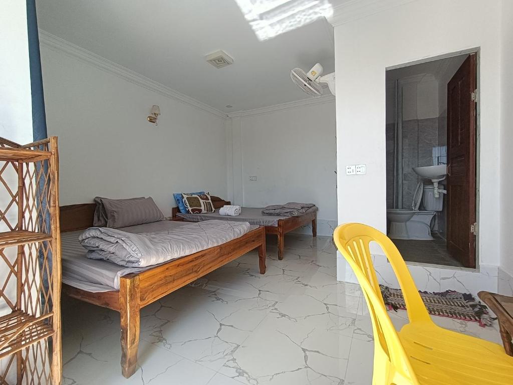 Postel nebo postele na pokoji v ubytování El Ling guesthouse