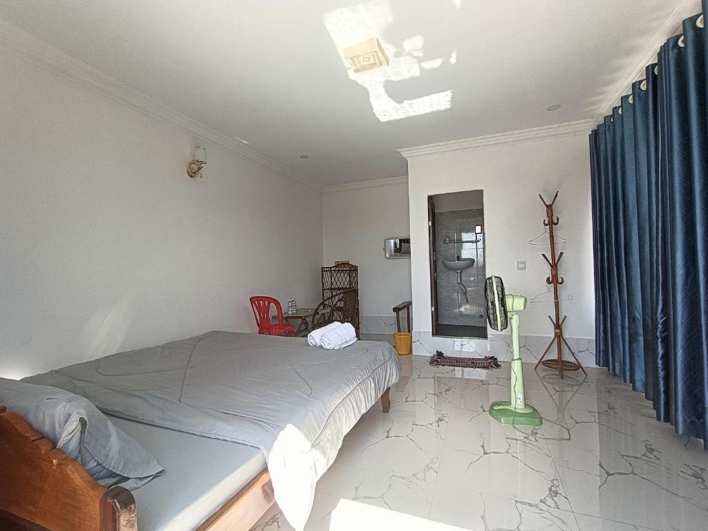 Postel nebo postele na pokoji v ubytování El Ling guesthouse