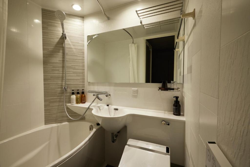 Koupelna v ubytování ALFIT HOTEL & BAR AKASAKA