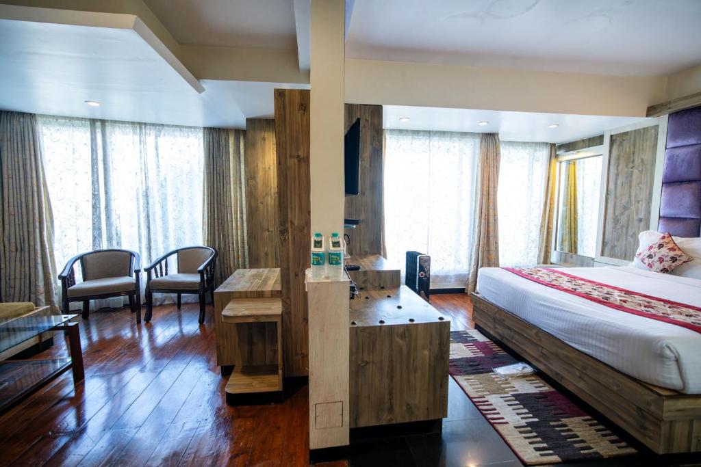 Postel nebo postele na pokoji v ubytování Hotel Viceroy