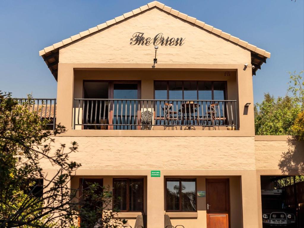 a building with a sign that reads the tavern at The Orion in Middelburg