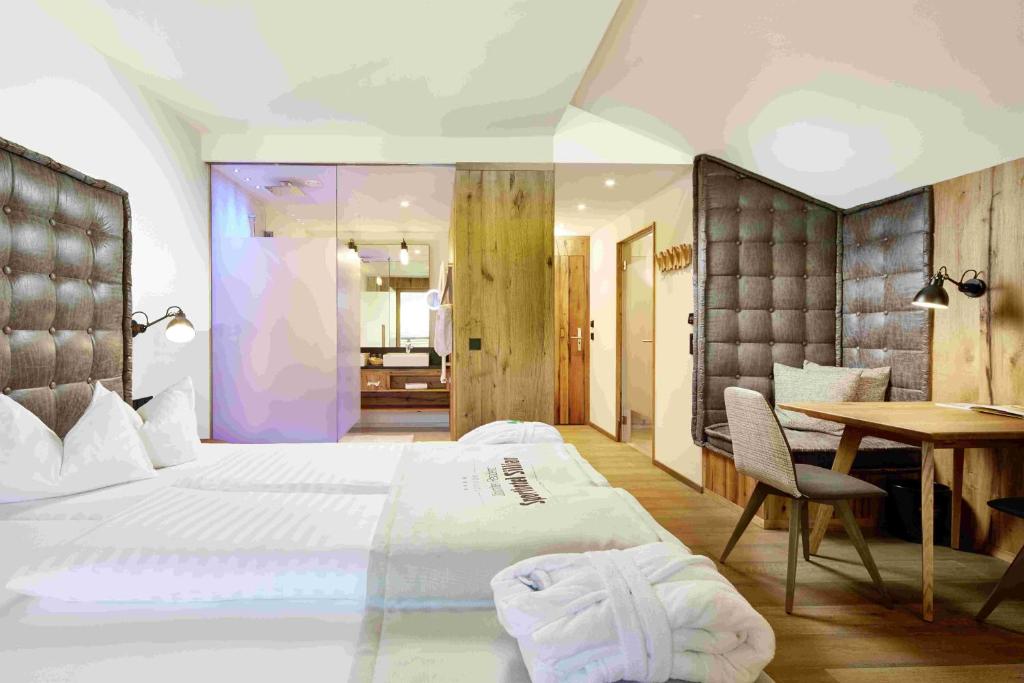 Posteľ alebo postele v izbe v ubytovaní Dolomiten Residenz - Sporthotel Sillian