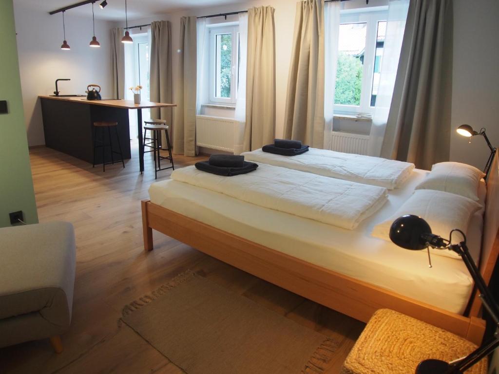 Ένα ή περισσότερα κρεβάτια σε δωμάτιο στο Alte Seifensiederei - Rainer Maria