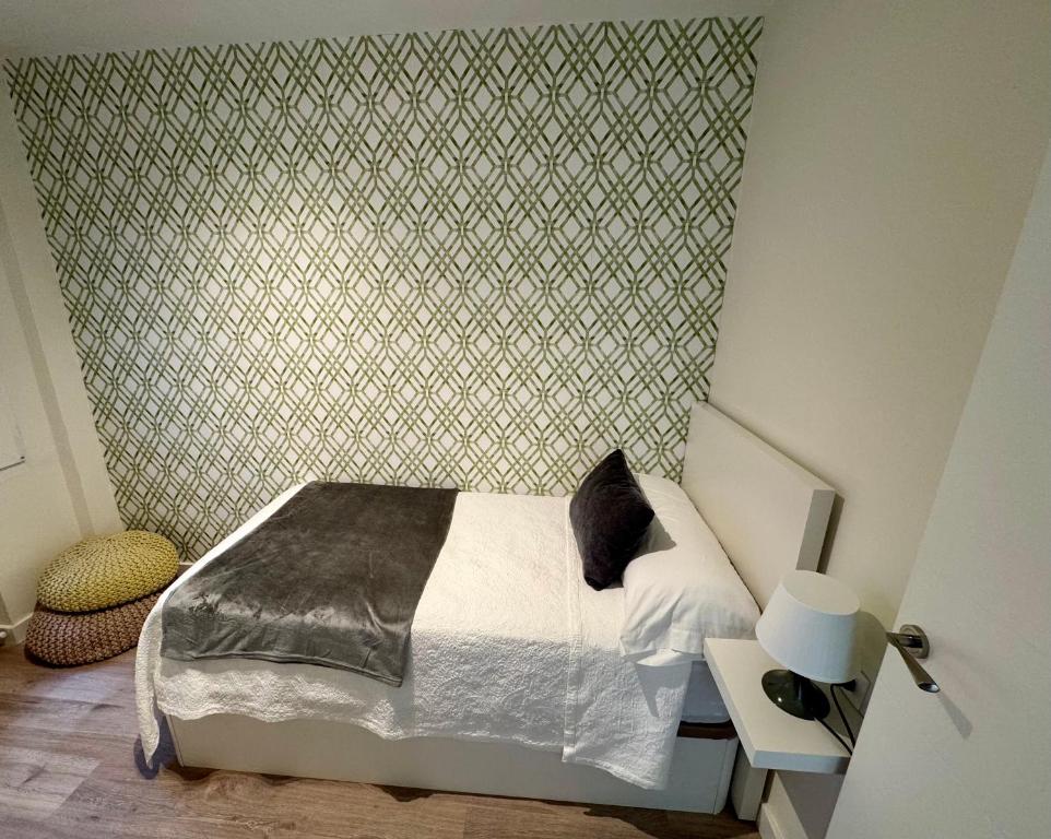 Postel nebo postele na pokoji v ubytování Apartamento Quintana