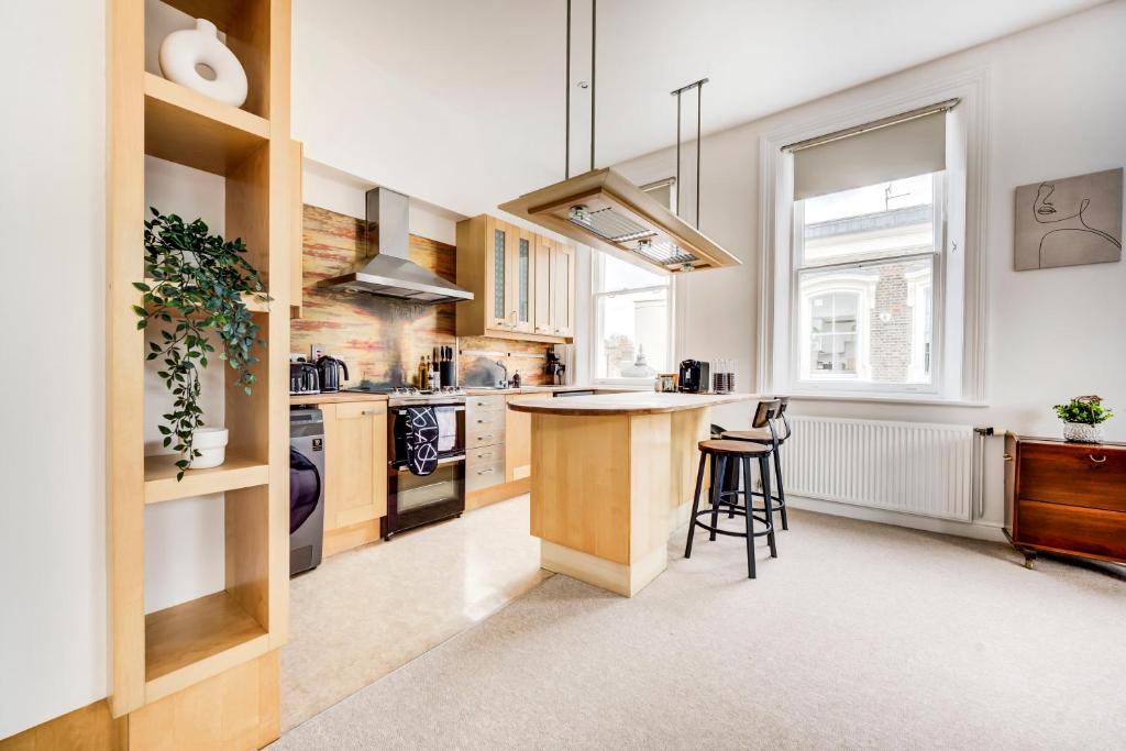 Køkken eller tekøkken på Duplex Apartment Shoreditch - the Living Elite Collection
