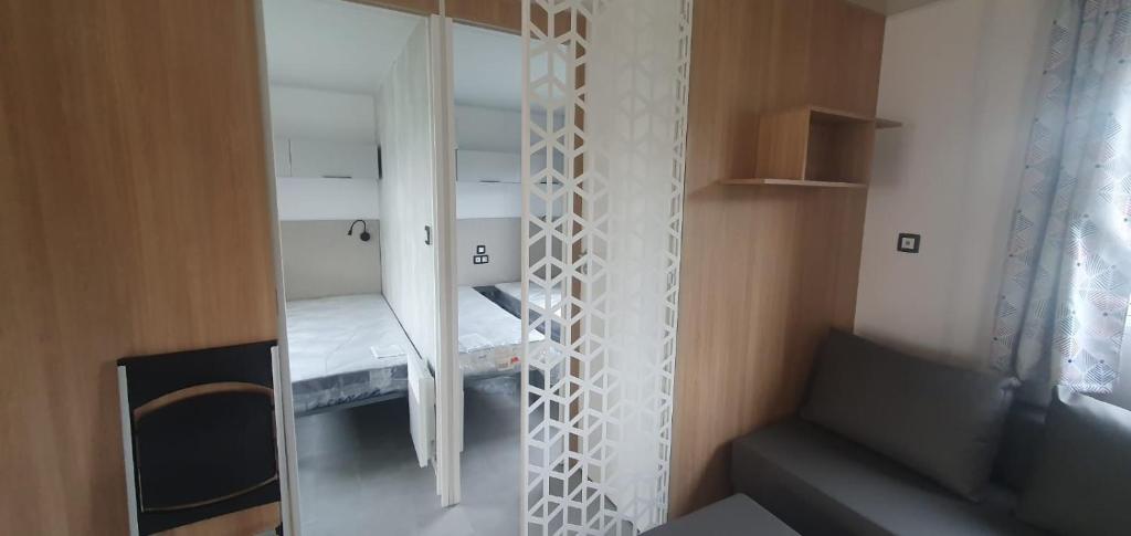 Posezení v ubytování Mobile home à Mimizan géré par un particulier