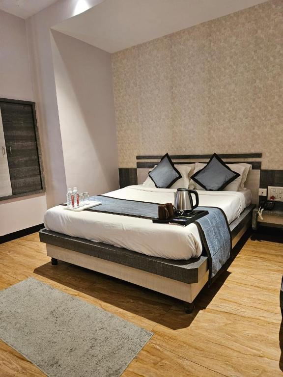 Postel nebo postele na pokoji v ubytování Hotel Kiara Eshosans Palace