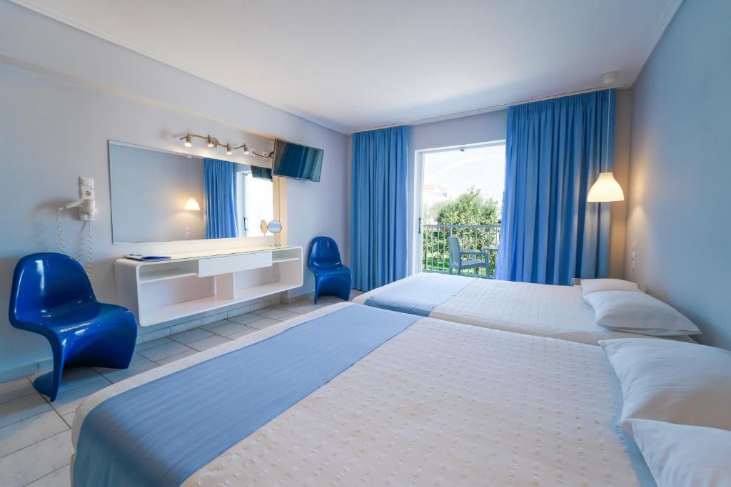 Postel nebo postele na pokoji v ubytování Filoxenia Hotel Zakynthos