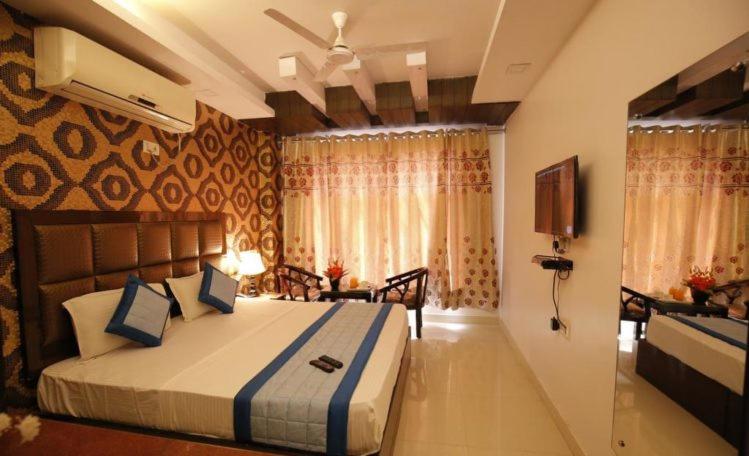 Postel nebo postele na pokoji v ubytování Hotel Delhi Pride, Karol Bagh