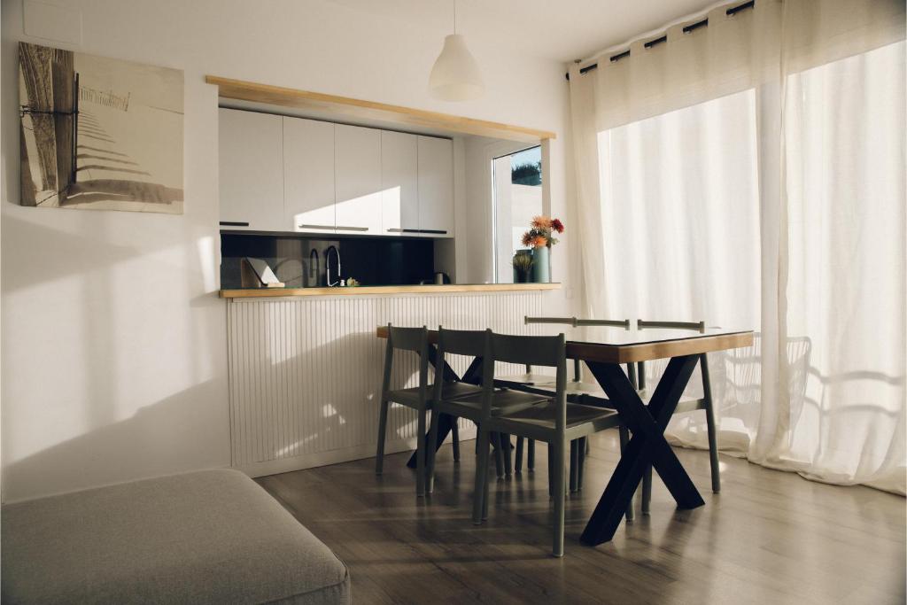 Kuchyň nebo kuchyňský kout v ubytování Gran Apartmento Playa Badalona