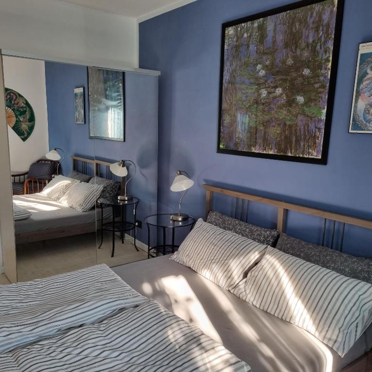 Postel nebo postele na pokoji v ubytování B&B La Terrazza Sui Fieschi