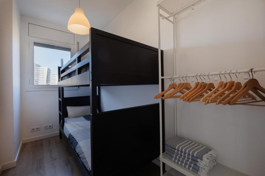 Postel nebo postele na pokoji v ubytování Gran Apartmento Playa Badalona