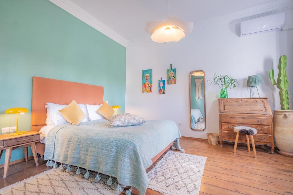 Postel nebo postele na pokoji v ubytování Villa Beldi