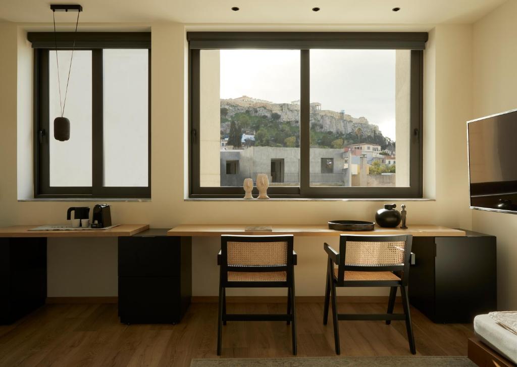 Kuchyň nebo kuchyňský kout v ubytování Athens Woo Suites